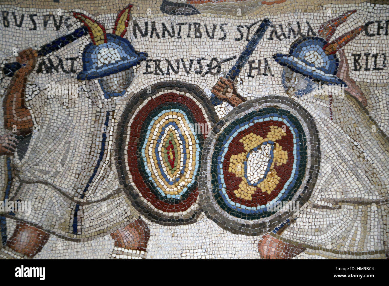 Gladiator fight. Mosaic. 3rd century. Rome. Two Eques flanked by two lanistae. National Archaeological Museum, Madrid. Spain. Stock Photo