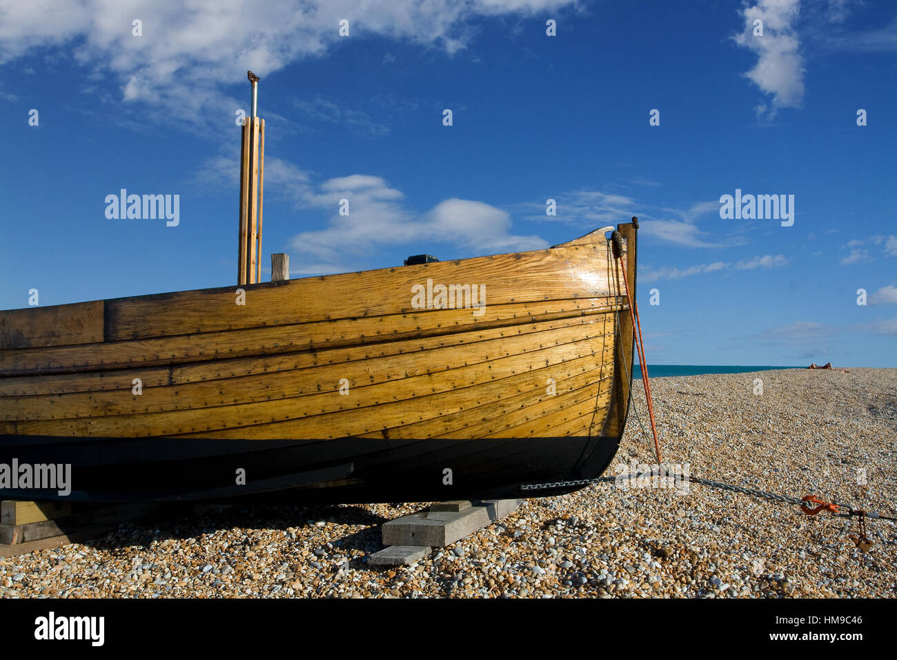 Wooden fishing boat on shingle beach in Kent, England Stock Photo - Alamy