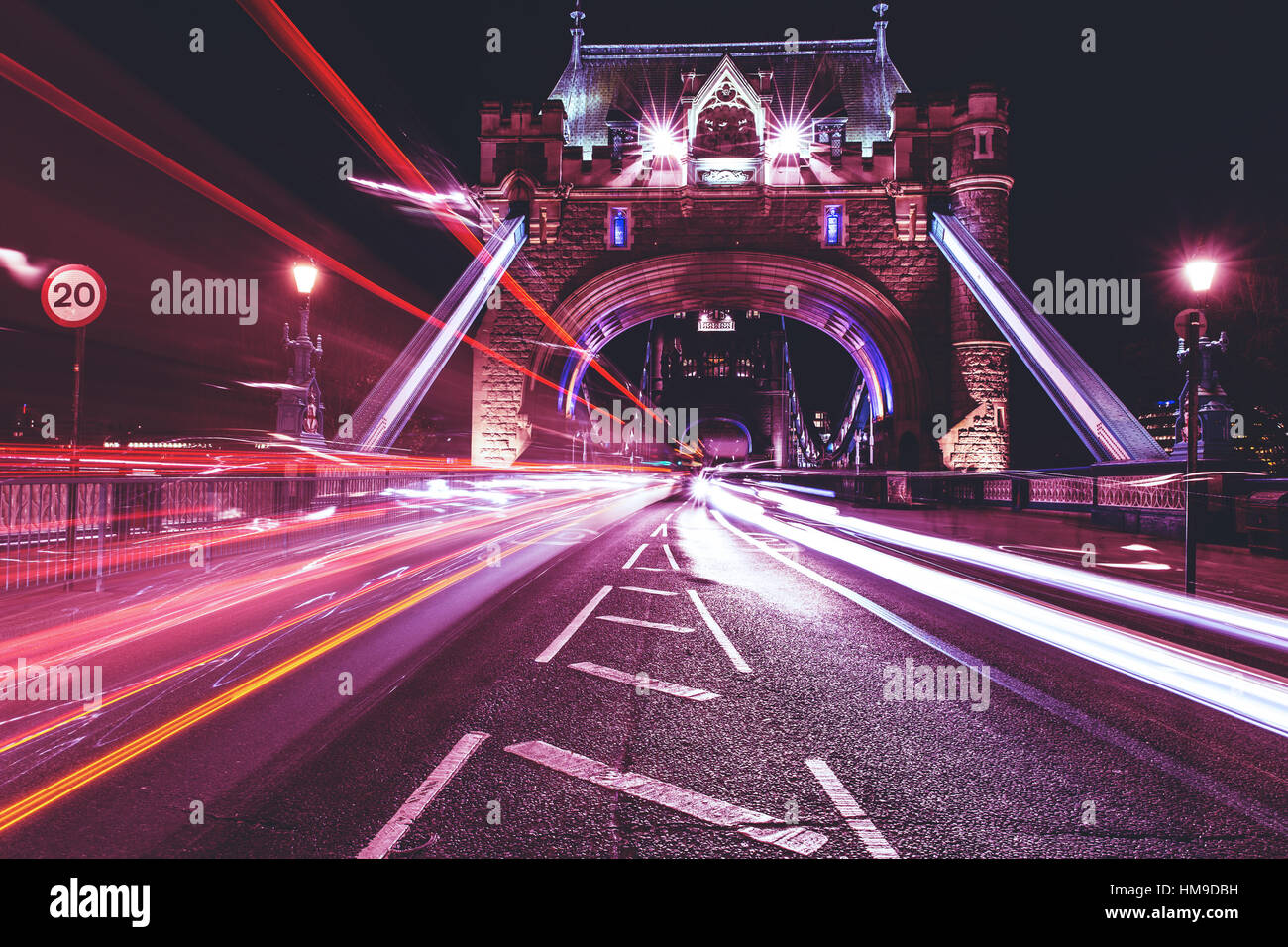 Tower Bridge traffic light trails at night in London Stock Photo - Alamy