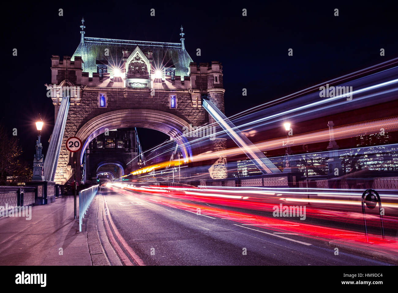 Tower Bridge traffic light trails at night in London Stock Photo - Alamy