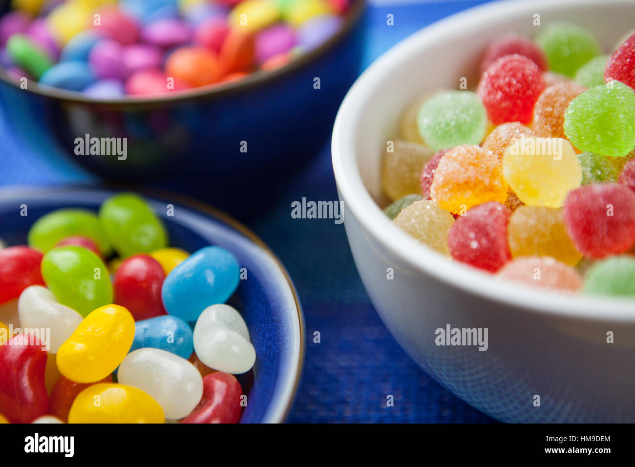 Colorful candy sweets in bowls Stock Photo