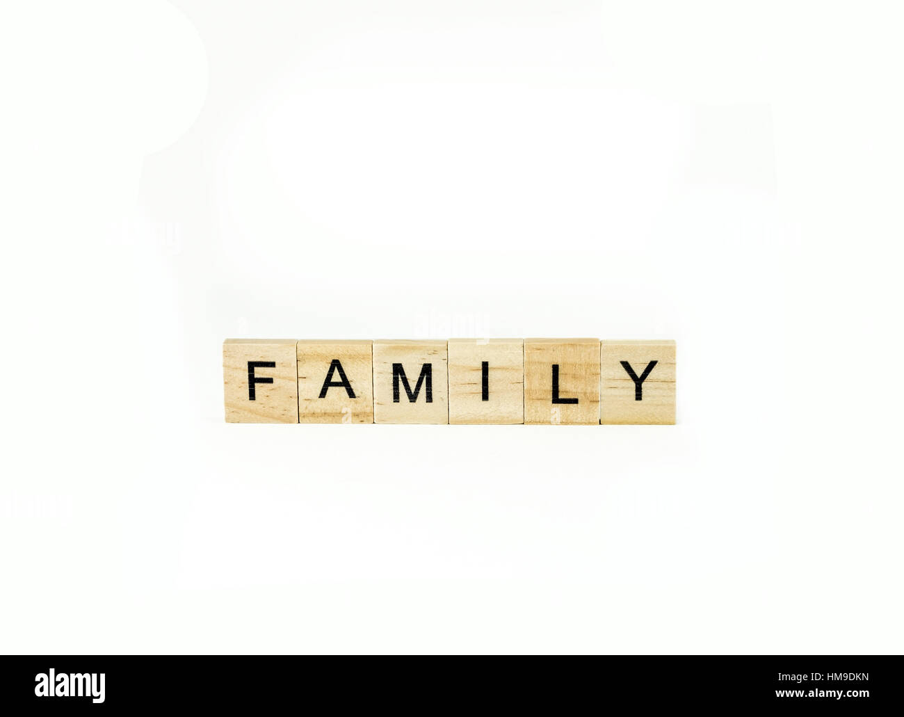 Concept. Block letters spelling Family. Cutout. Stock Photo