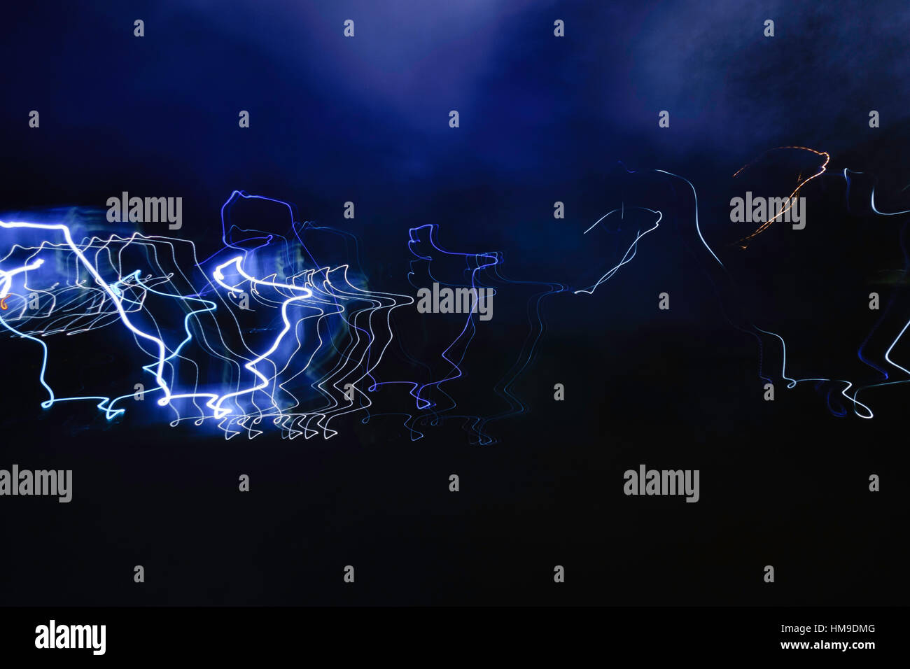 Squiggly lines of bright electrical impulses, concept electrical activity brain, body, gone awry. Concept image. Stock Photo