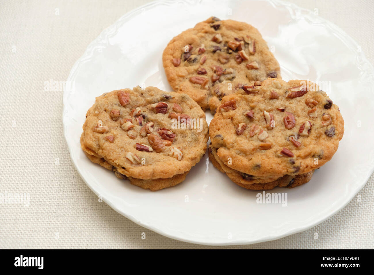 6 Fresh Warm Chocolate Chip Pecan Cookies On A White Plate Studio Closeup USA Stock Photo Alamy