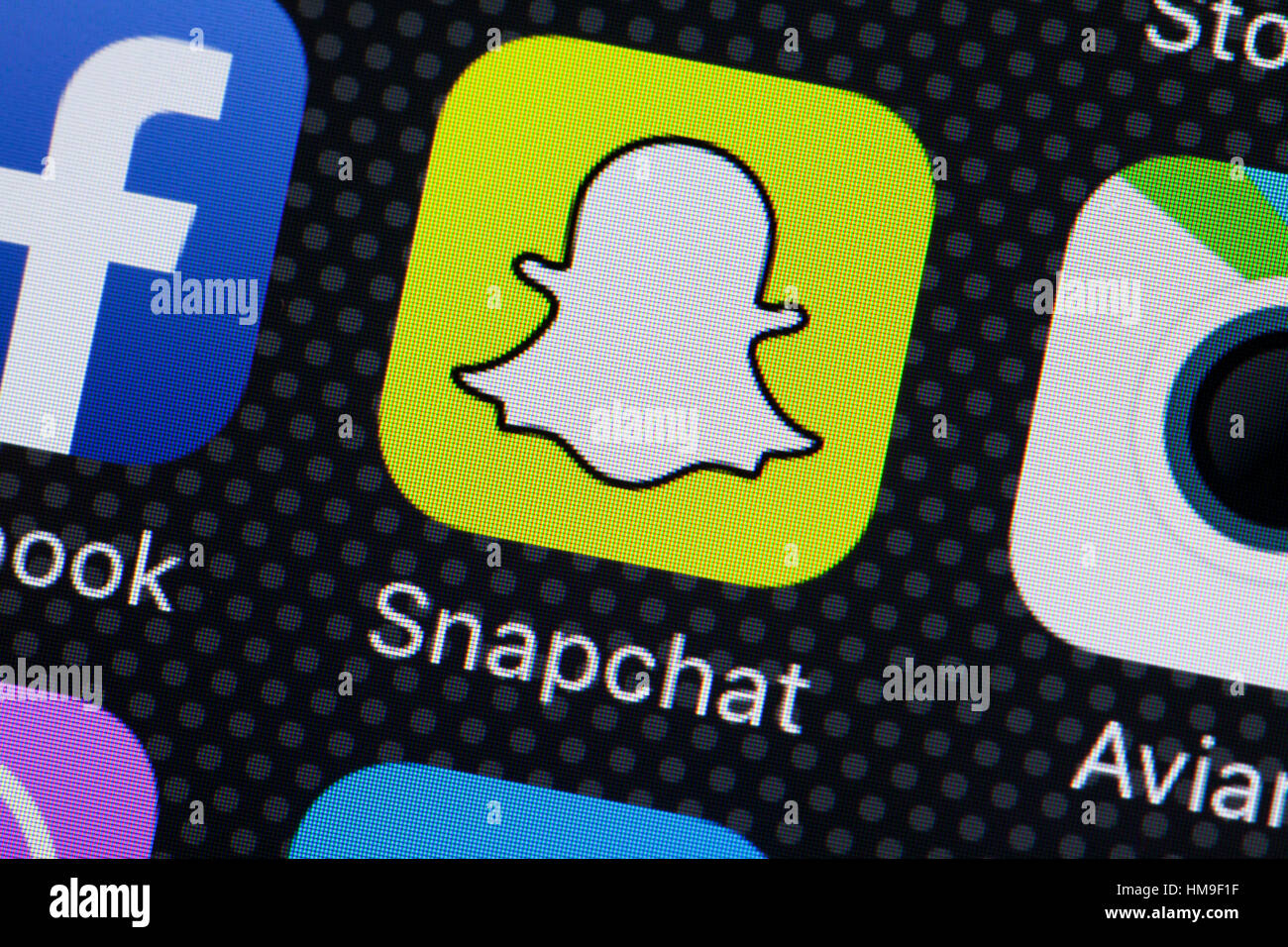 Snapchat app icon on mobile screen - USA Stock Photo