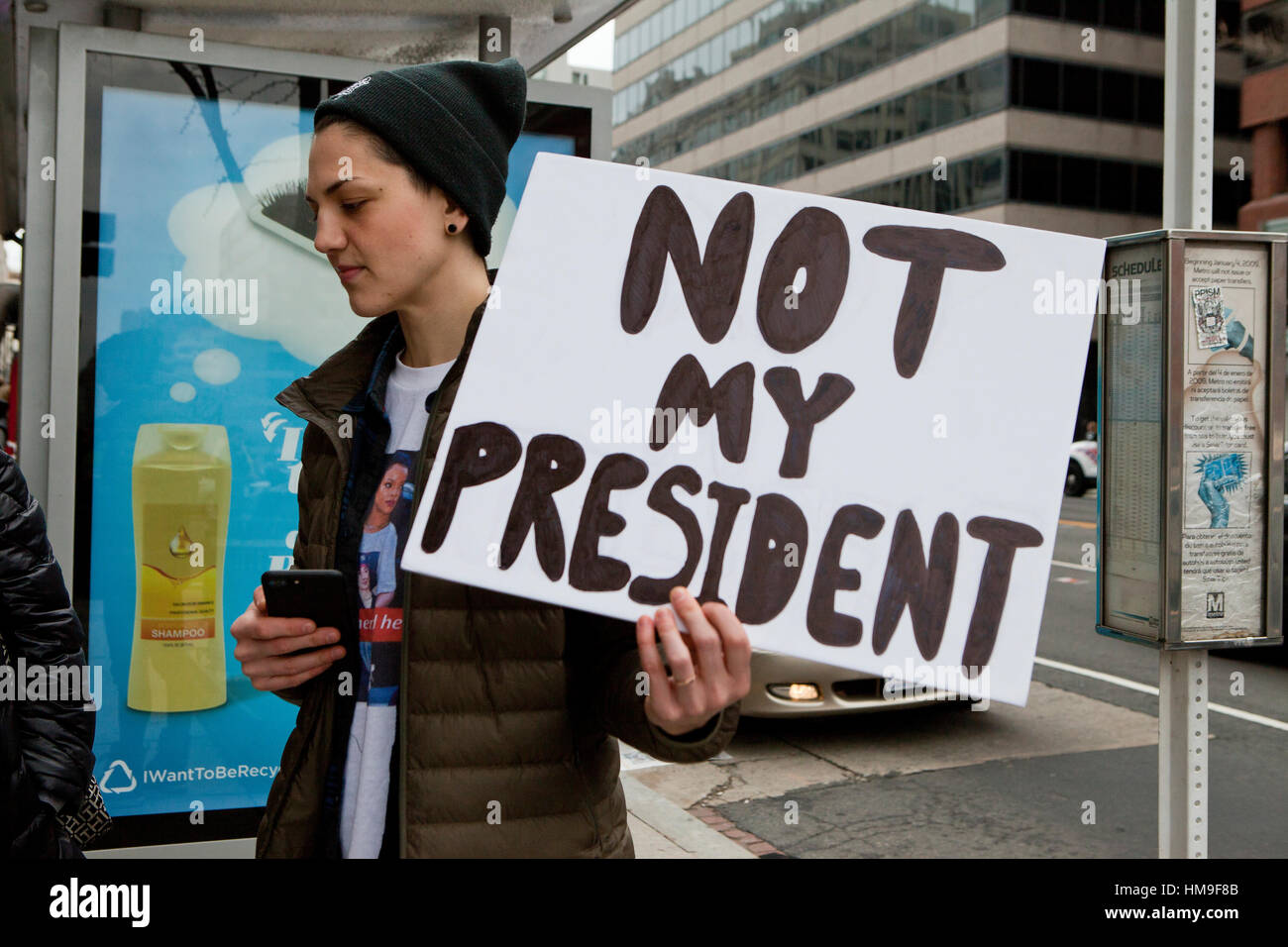 Jan. 20th, 2016, Washington, DC USA: Woman holding 'Not My President' sign during 2017 presidential inauguration protest Stock Photo
