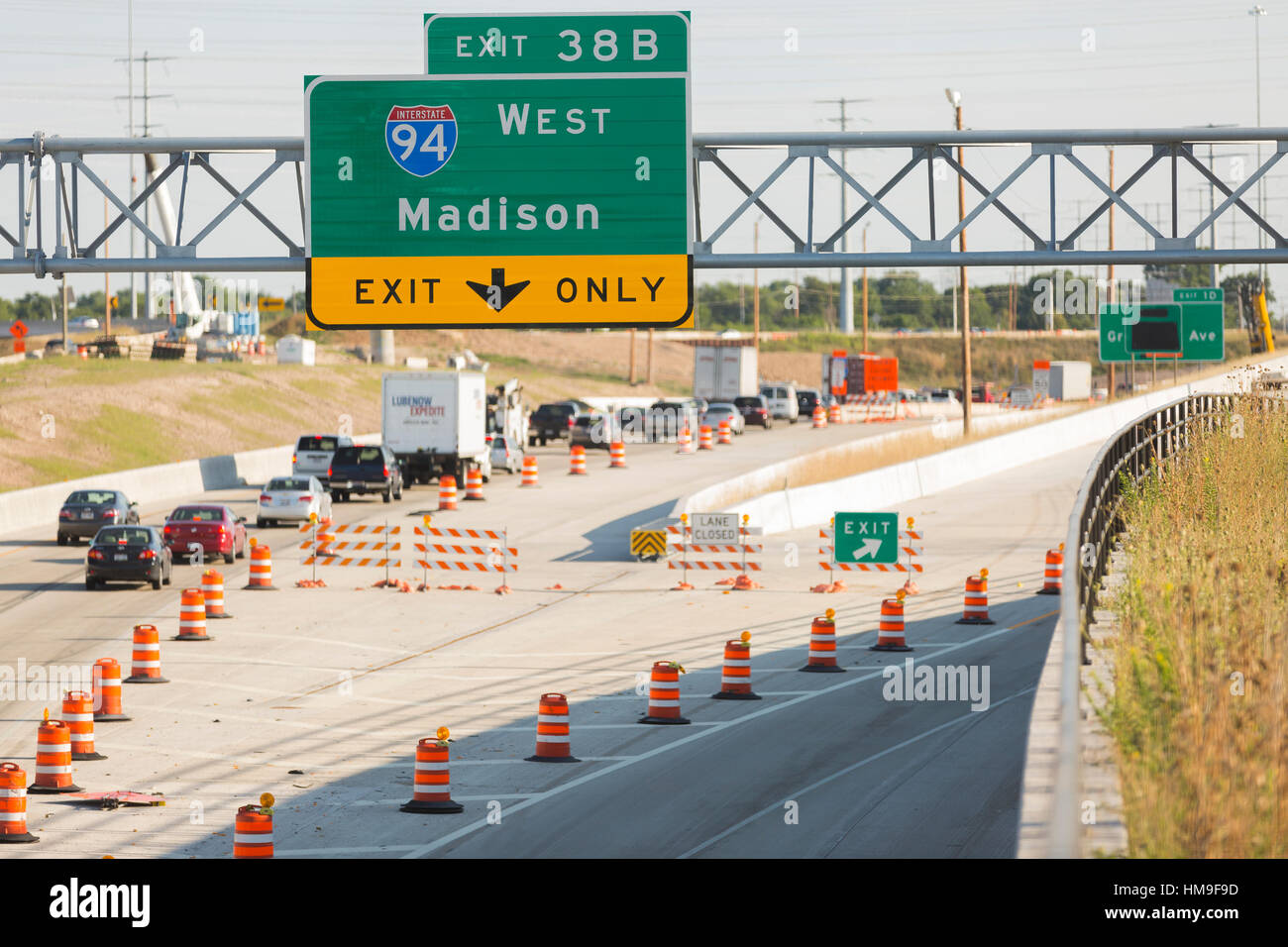 Interstate construction with merging lanes and orange cones Stock Photo