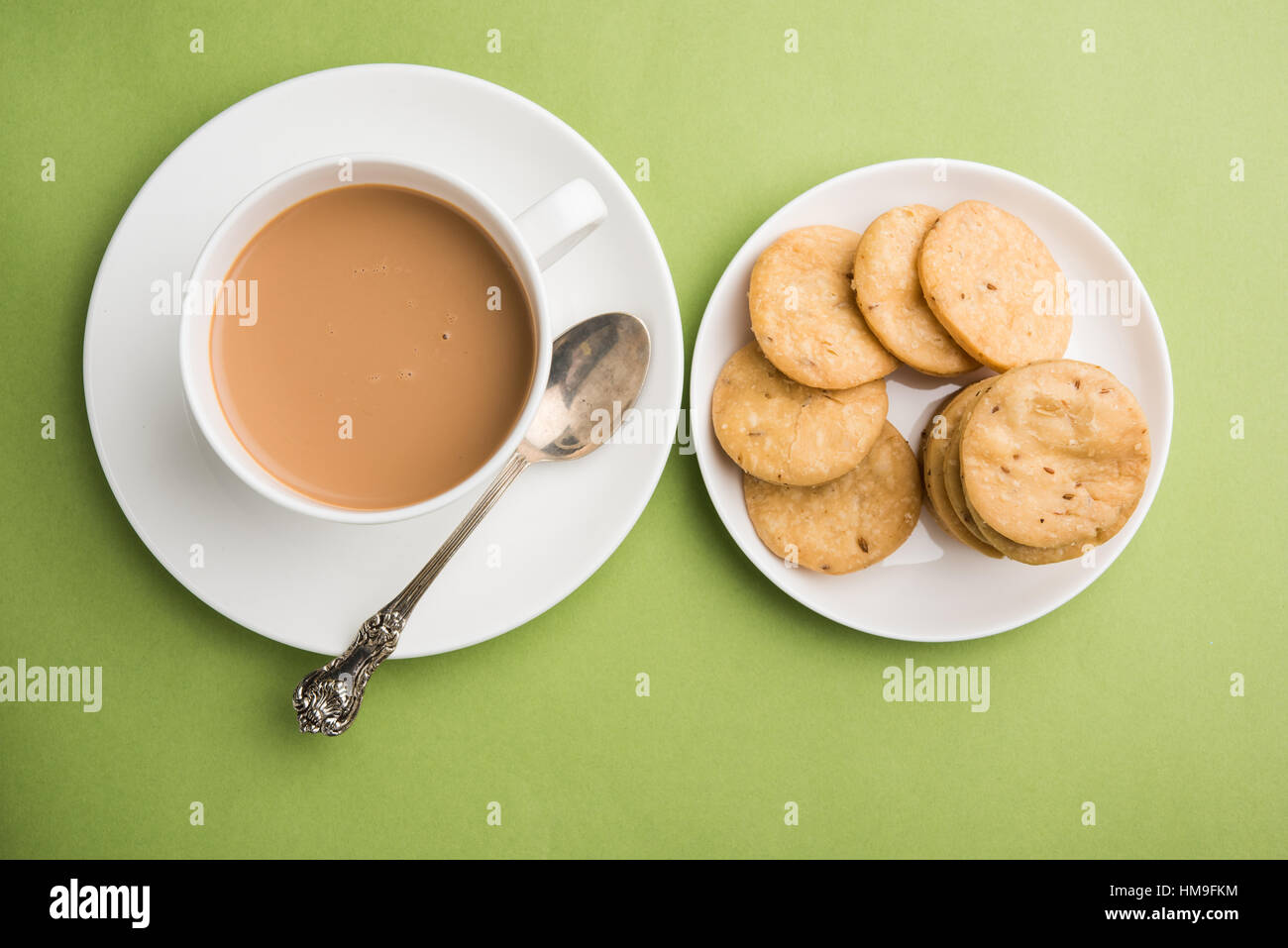 spicy fried mathri or mathari which is an indian snack served with a ...