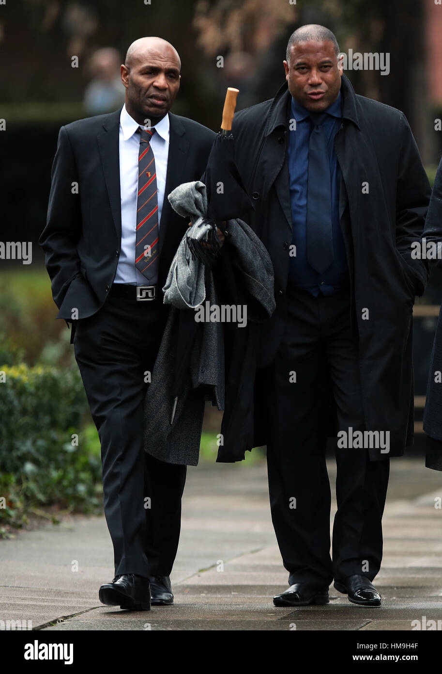 John Barnes and Luther Blissett (left) arrive for the funeral service for Graham Taylor held at St Mary's Church, Watford. Stock Photo