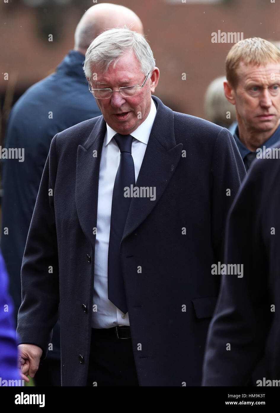 Sir Alex Ferguson arrives for the funeral service for Graham Taylor