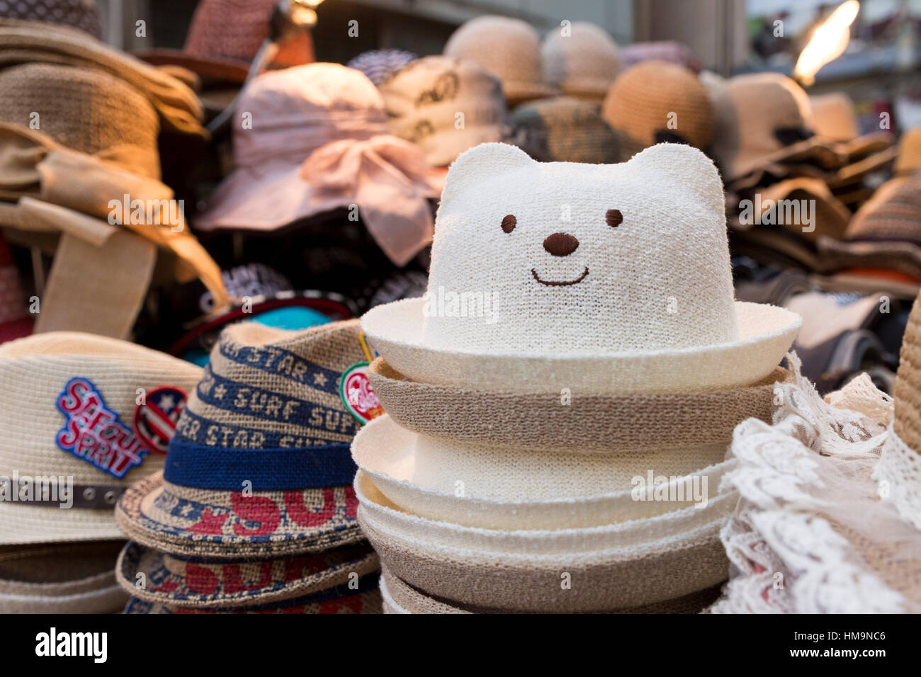 Hat with the shape of a teddy bear for sale in Gukje Market, Busan, South Korea Stock Photo