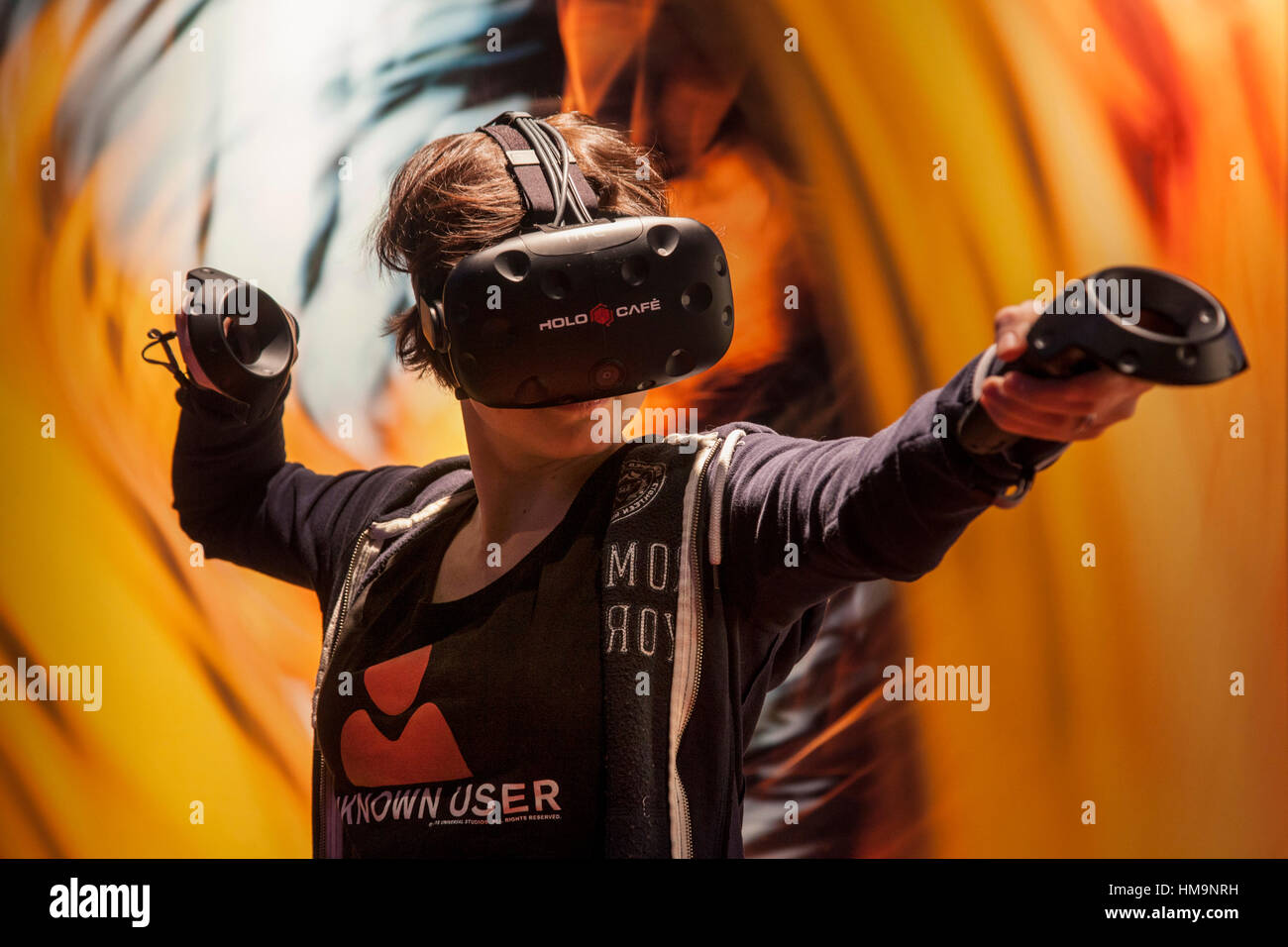 The world of the Virtual Reality - 3D Gaming with a VR gaming headset Stock Photo
