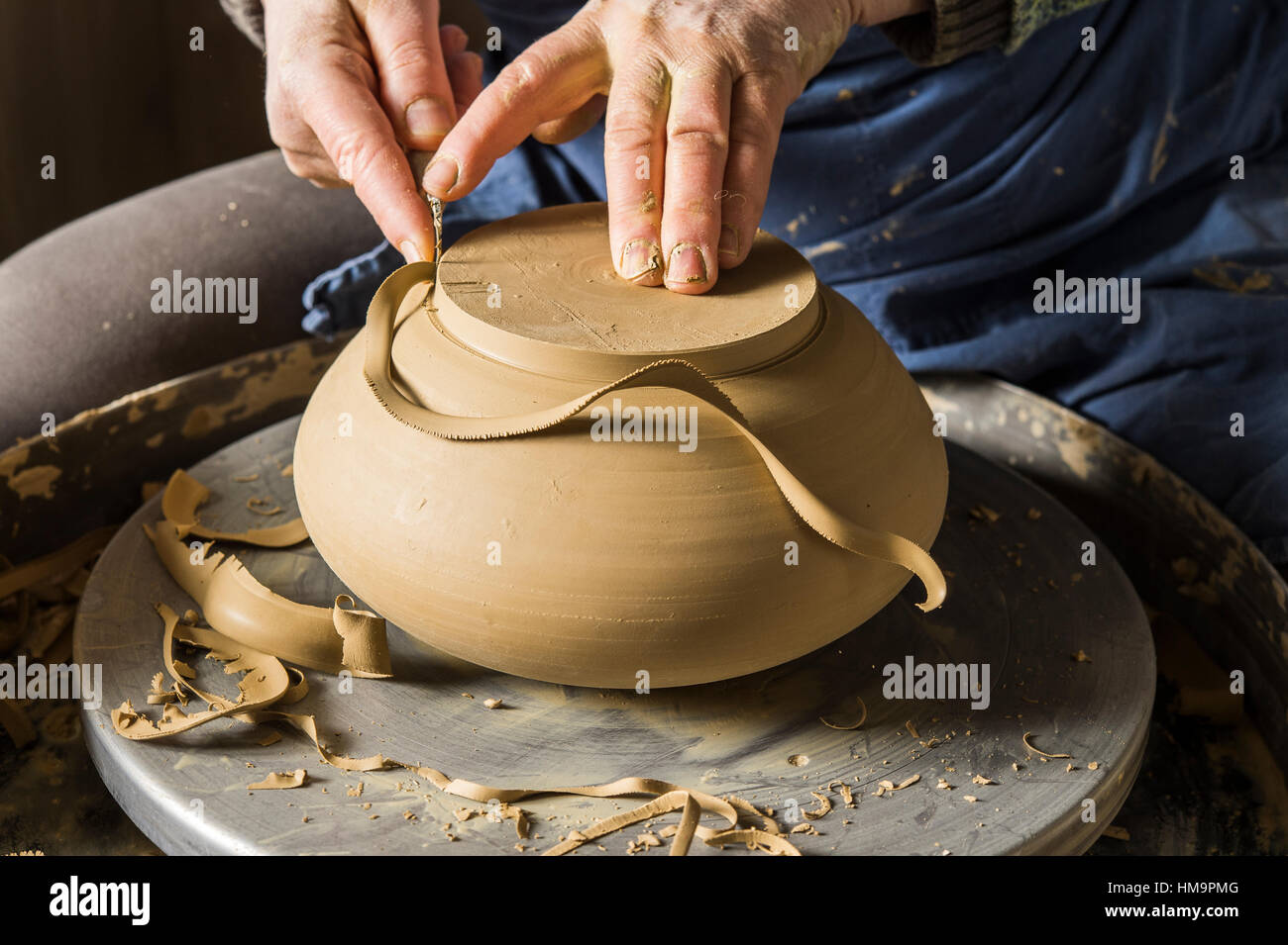 Ceramic workshop, hands shape bottom of pot on pottery wheel, Pittenhart, Upper Bavaria, Germany Stock Photo