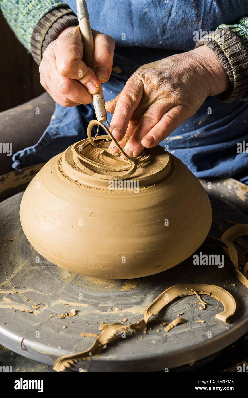 Ceramic workshop, hands shape bottom of pot on pottery wheel, Pittenhart, Upper Bavaria, Germany Stock Photo