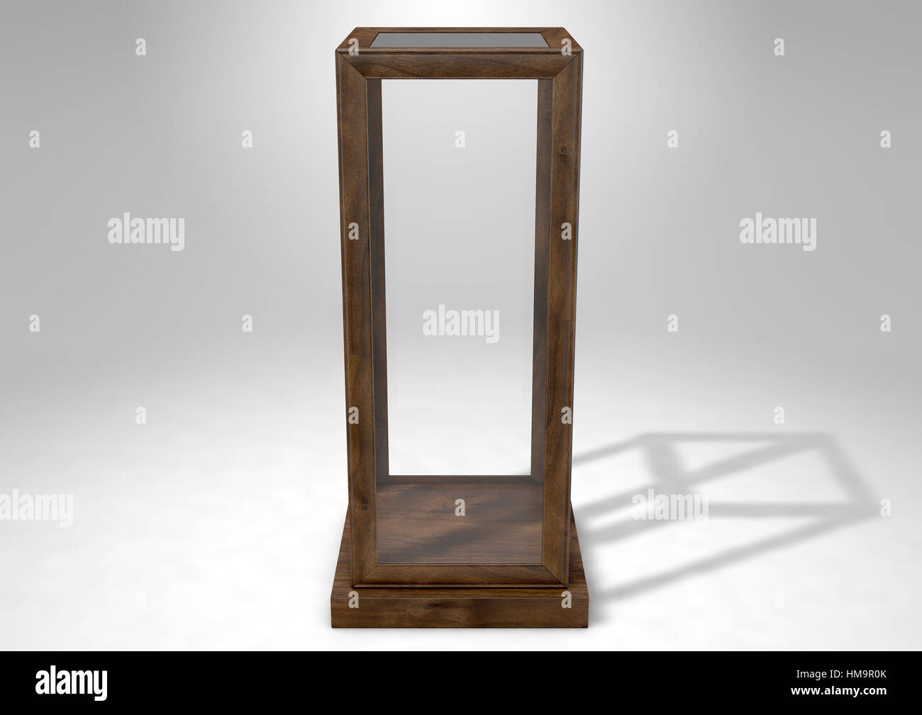 An empty vertical glass display case with a wooden base and frame on an ...