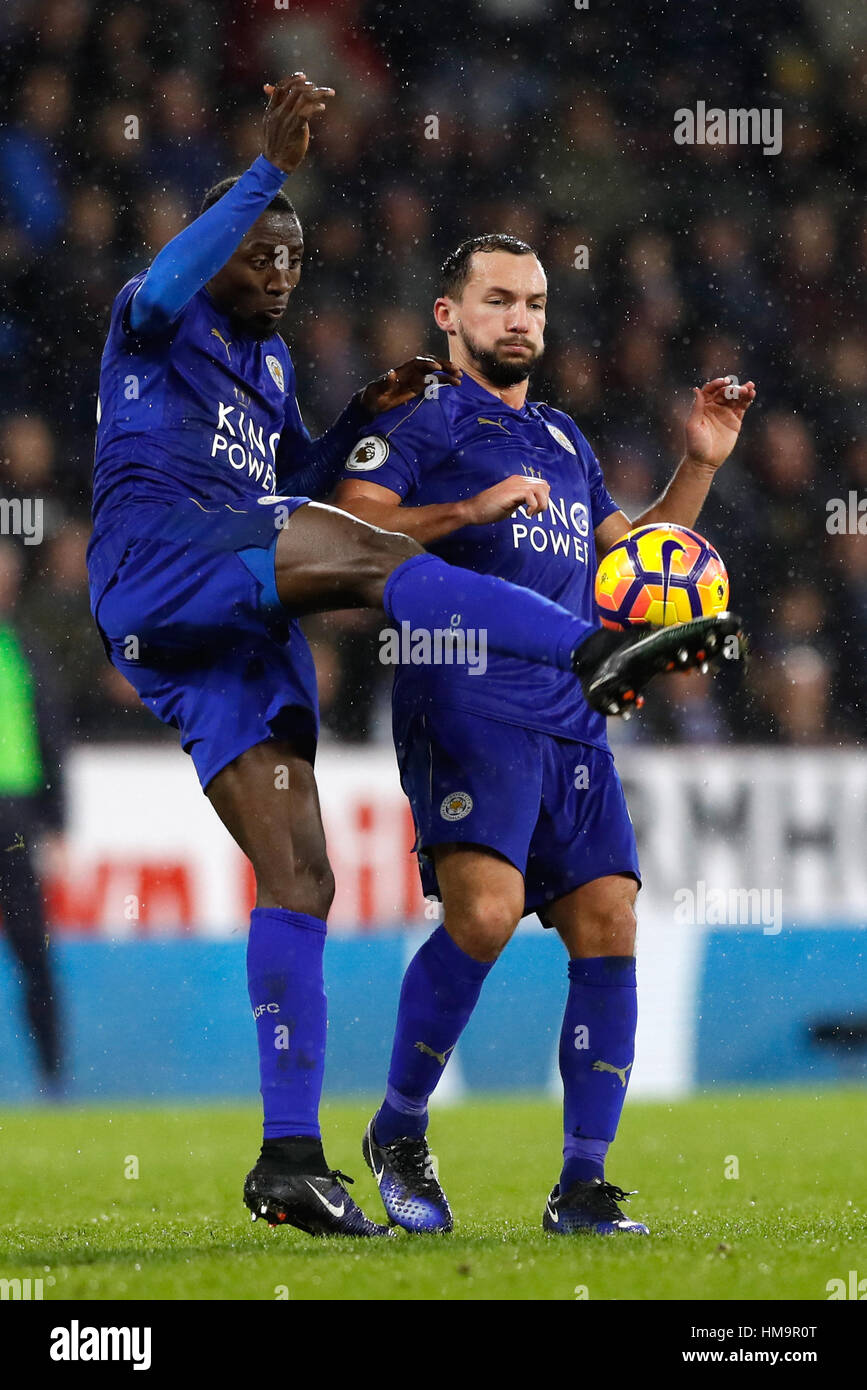 Leicester City's Ahmed Musa (left) and Leicester City's Daniel Drinkwater battle for the ball during the Premier League match at Turf Moor, Burnley. PRESS ASSOCIATION Photo. Picture date: Tuesday January 31, 2017. See PA story SOCCER Burnley. Photo credit should read: Martin Rickett/PA Wire. RESTRICTIONS: EDITORIAL USE ONLY No use with unauthorised audio, video, data, fixture lists, club/league logos or 'live' services. Online in-match use limited to 75 images, no video emulation. No use in betting, games or single club/league/player publications. Stock Photo