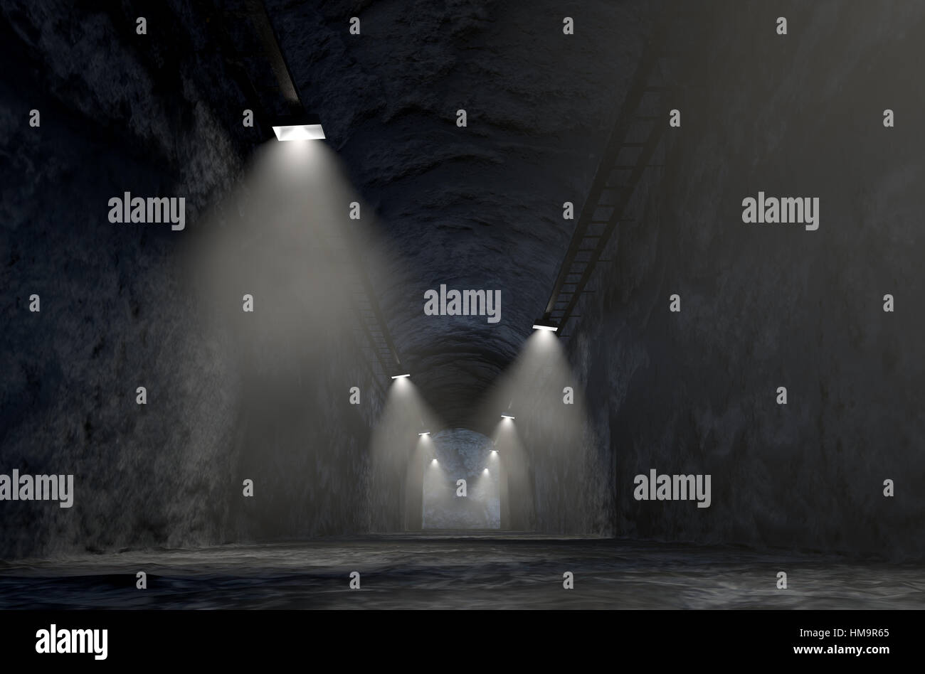 A look down the shaft of a rock mine  spotlit by lights. 3D render. Stock Photo