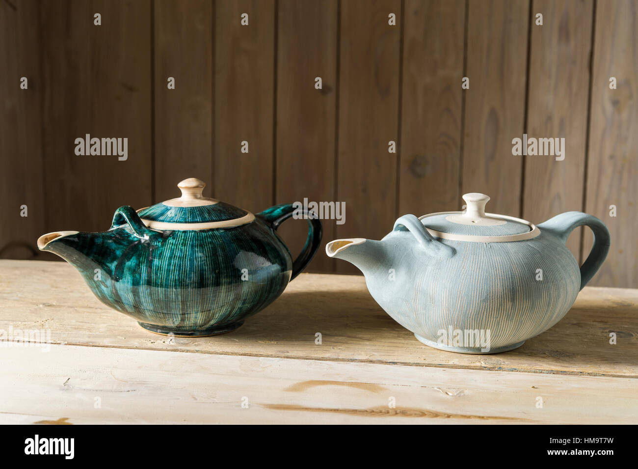 Ceramic finished pot on the right, glazed pot on the left