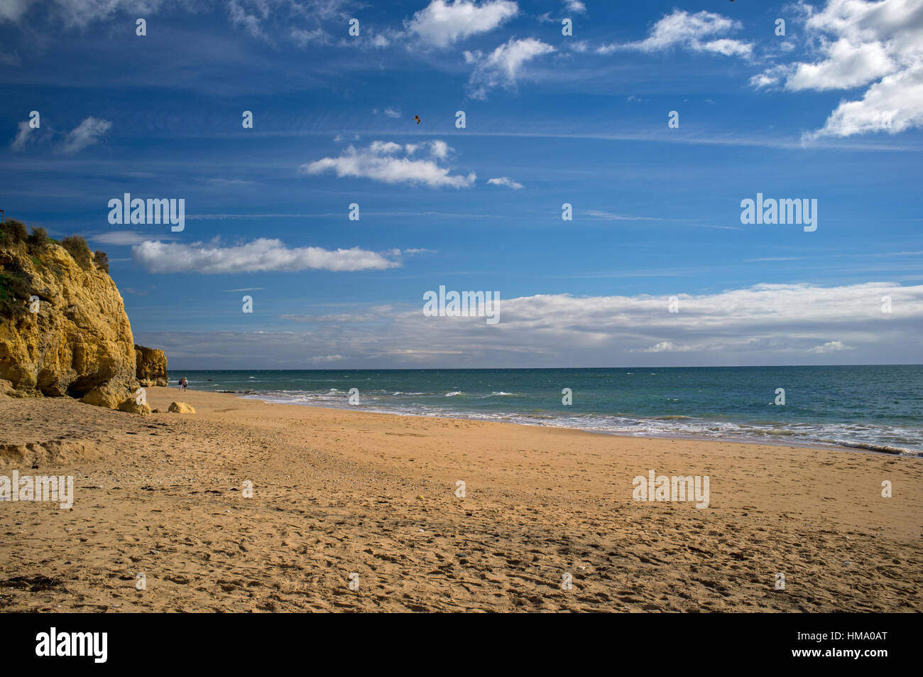 A Sandy beach , blue skies and gorgeous azure sea Stock Photo