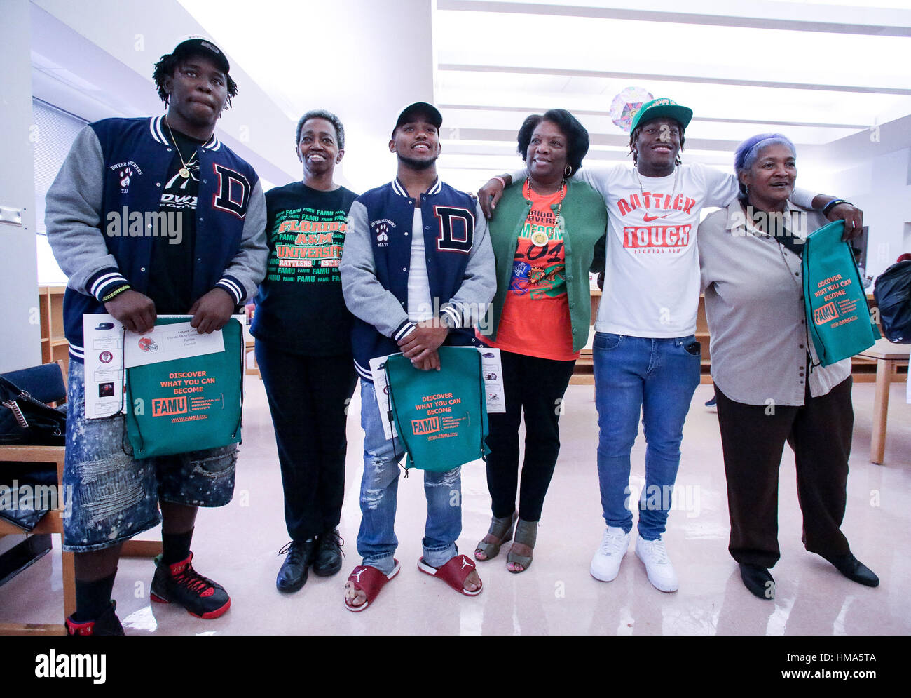 Florida, USA. 1st Feb, 2017. Dwyer high school football players (lr