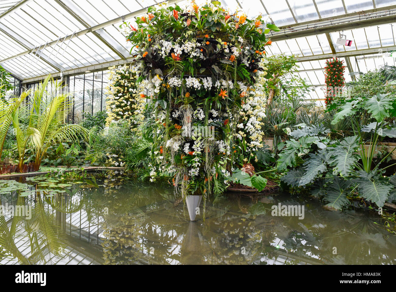 London, UK. 2nd Feb, 2017. A giant 3m x 2m floral display depicting a Samsara cone hangs over the pond in Kew Garden's annual Orchid Festival, which this year celebrates India's vibrant and colourful culture. The festival runs from 4 February to 5 March 2017. Credit: Stephen Chung/Alamy Live News Stock Photo
