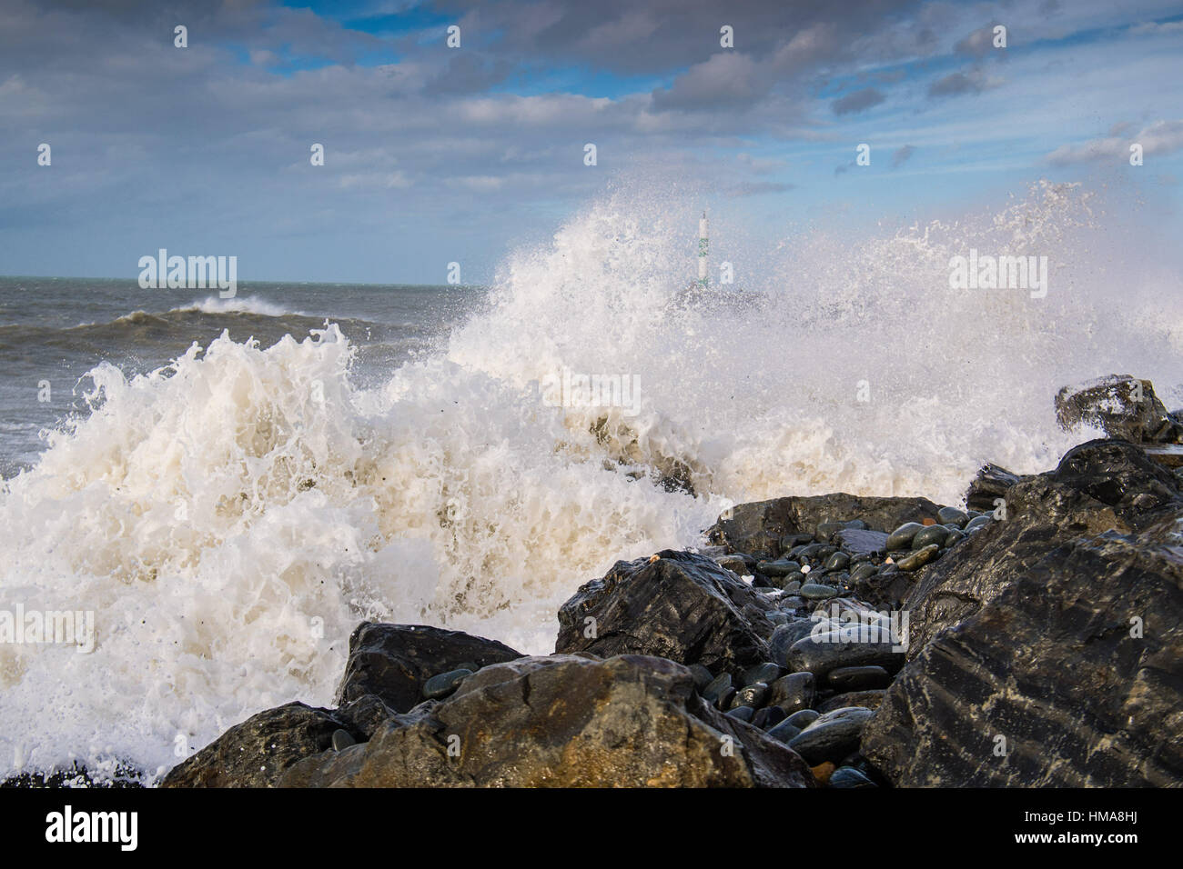 Aberystwyth Ceredigion Wales UK, Thursday 02 February 2017  UK Weather: Strong winds and high tides this morning bring huge waves crashing into the beach and sea defences in Aberystwyth on the west  wales coast. More strong and potentially damaging gales , with gusts in excess of 60mph are forecast to strike parts of southern UK tomorrow Credit: keith morris/Alamy Live News Stock Photo
