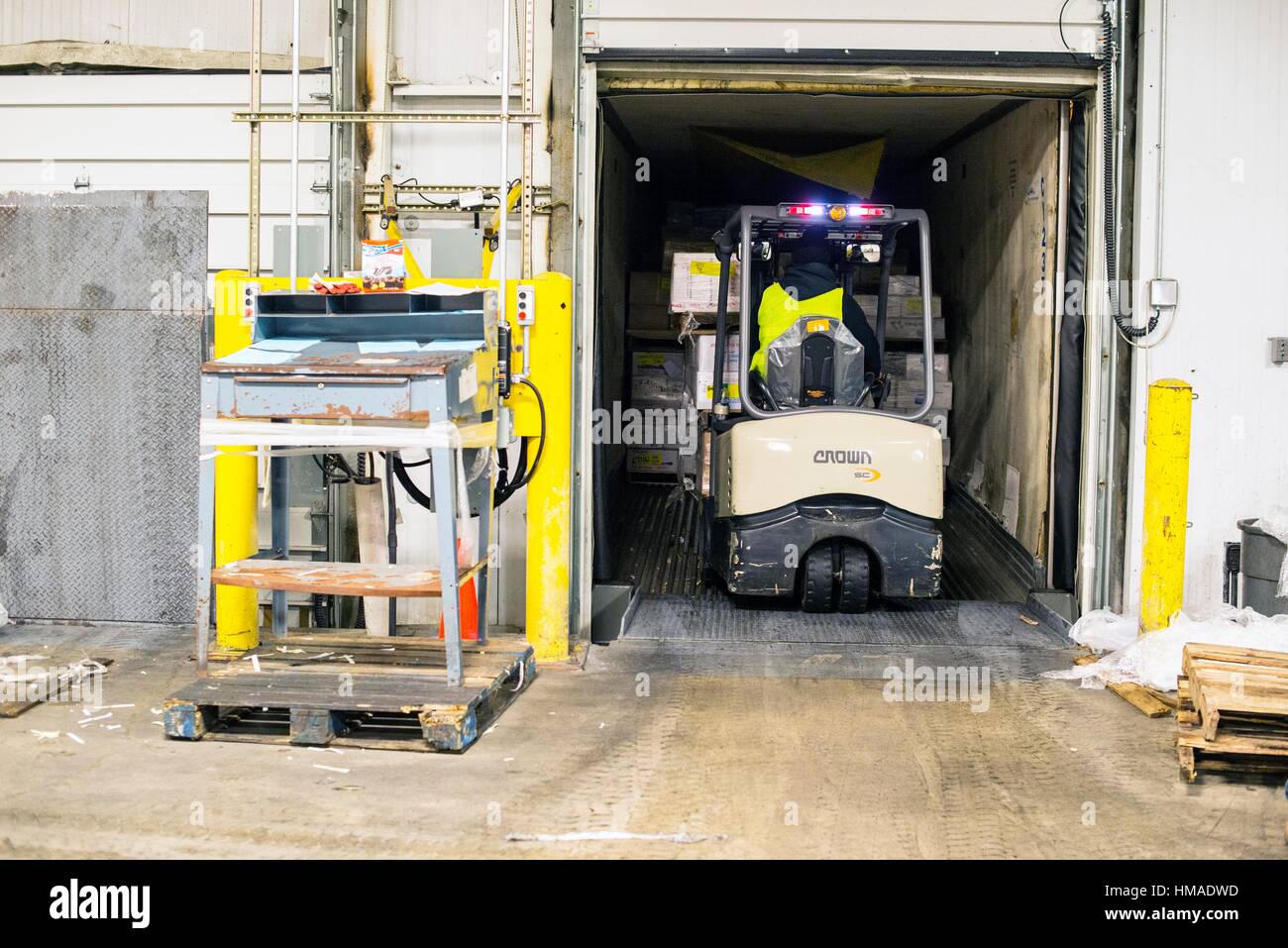 New York City, USA. Forklift unloading a delivery truck at the New