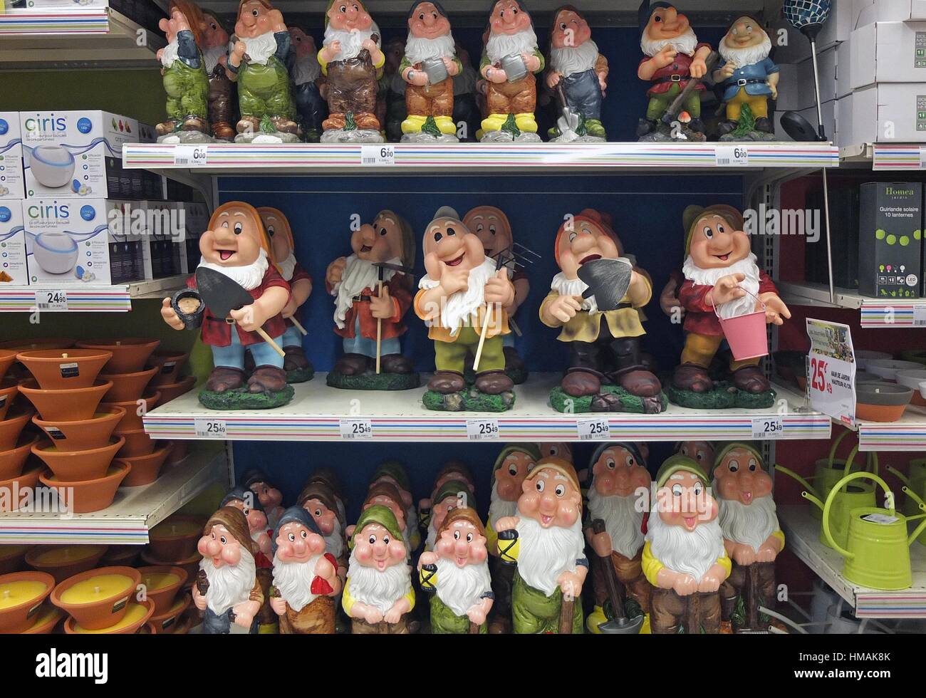 A Display Of Garden Gnomes For Sale In A Department Store Stock Photo Alamy