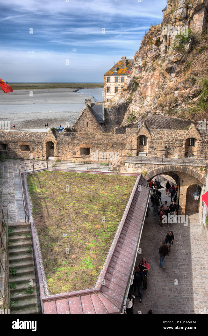 View from Top tower of coastal stone fortifications to entrance in Mont