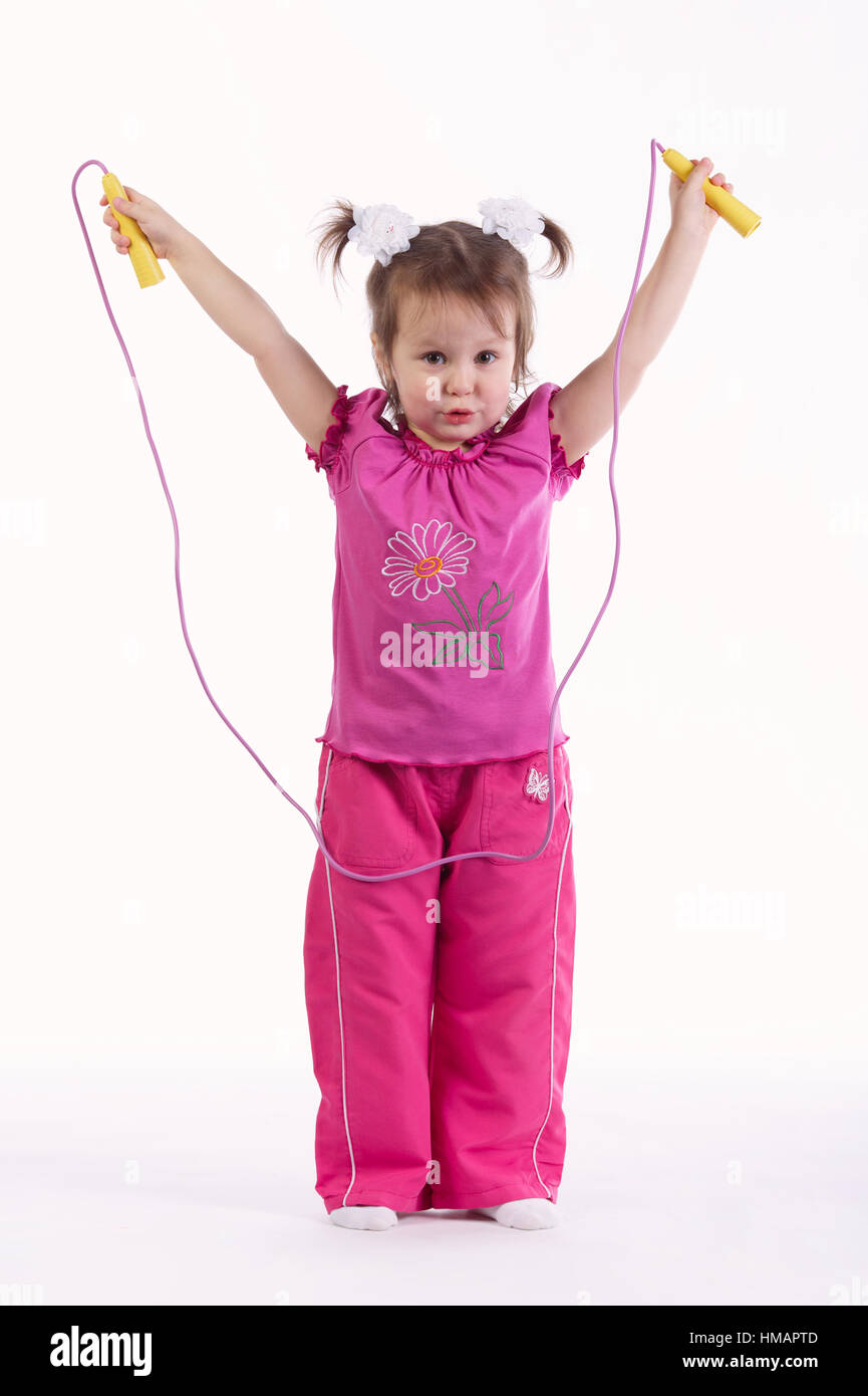 Little girl jumping rope hi-res stock photography and images - Alamy