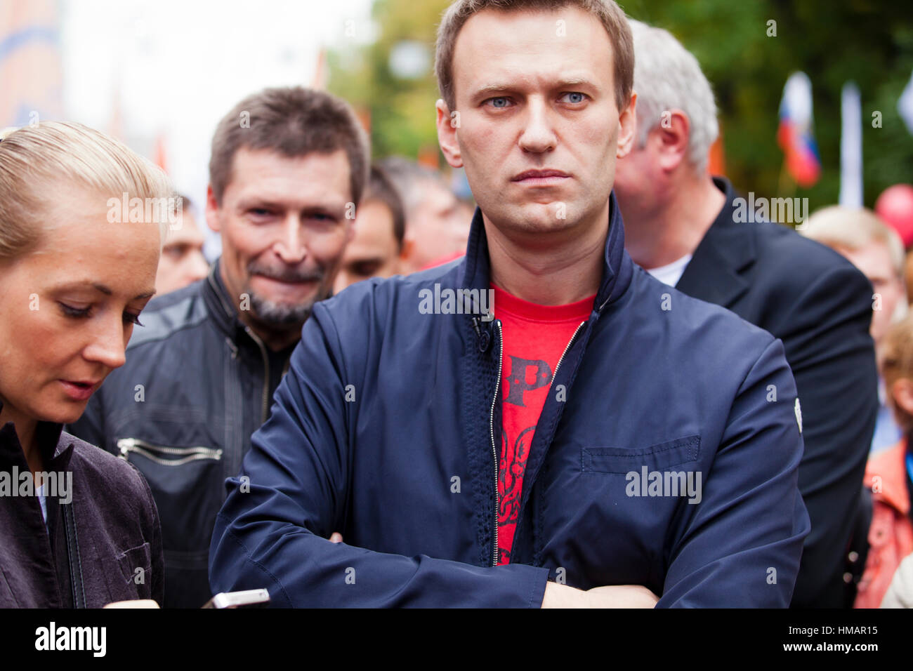 Russian opposition leader Alexei Navalny (right) and his wife Yulia (left) attend an opposition march through a street in Moscow Stock Photo
