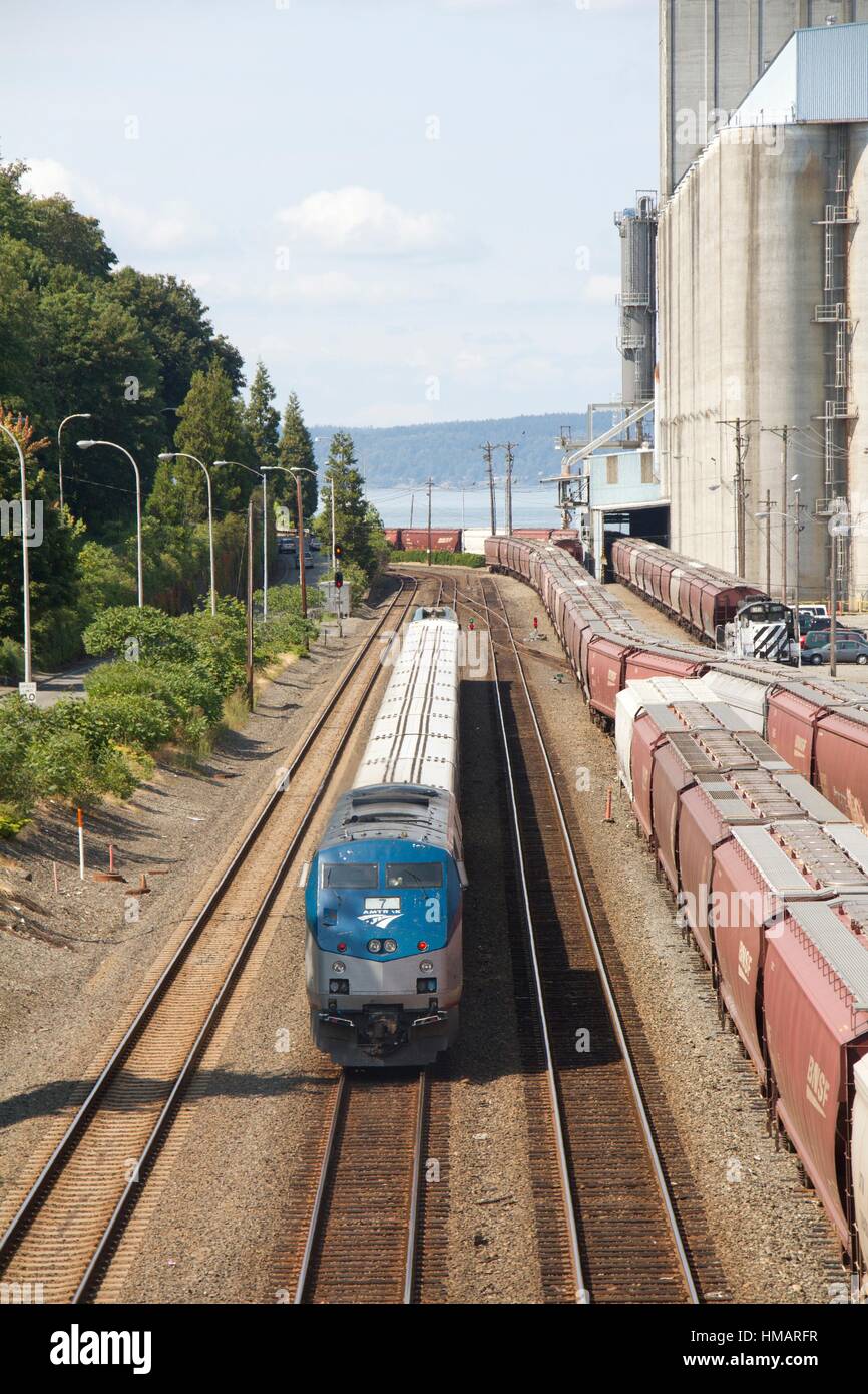An Amtrak Talgo passenger train just west of downtown Tacoma, Washington, USA and headed north toward Seattle. Stock Photo