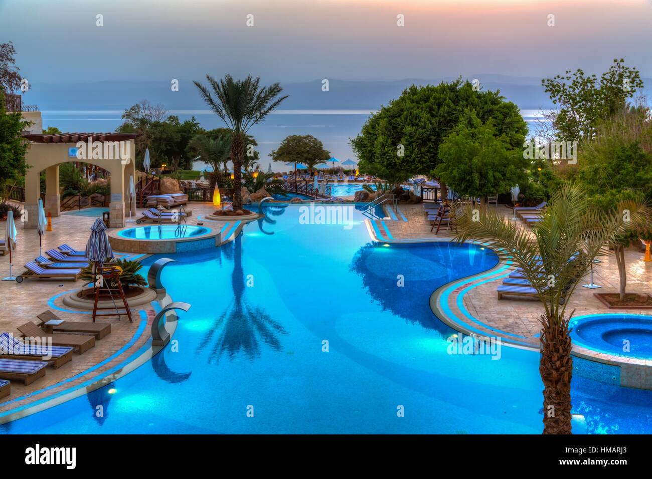 The Marriott Hotel resort at sunset on the Dead Sea, Hashemite Kingdom of  Jordan, Middle East Stock Photo - Alamy