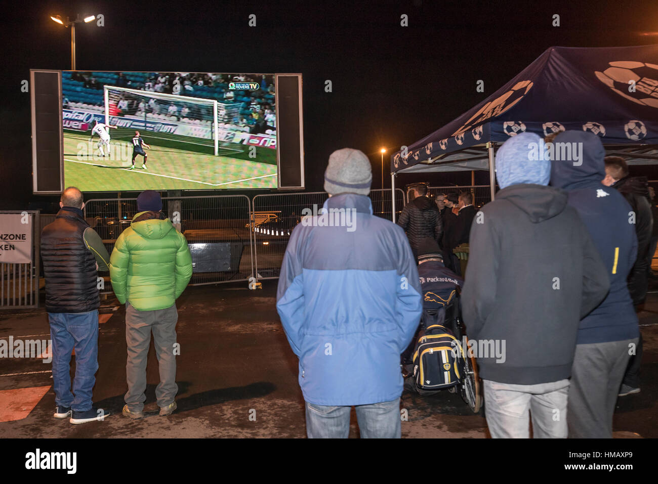 Fans watch a big screen ahead of the Sky Bet Championship match at Ewood Park, Blackburn. PRESS ASSOCIATION Photo. Picture date: Wednesday February 1, 2017. See PA story SOCCER Blackburn. Photo credit should read: Danny Lawson/PA Wire. RESTRICTIONS: No use with unauthorised audio, video, data, fixture lists, club/league logos or 'live' services. Online in-match use limited to 75 images, no video emulation. No use in betting, games or single club/league/player publications. Stock Photo