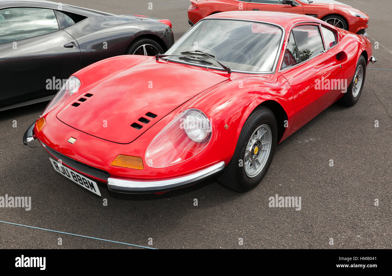 Three-quarter view of a 1973, 2.4L, Red Ferrari Dino 246 GT, on display at the  2016 Silverstone Classic Stock Photo