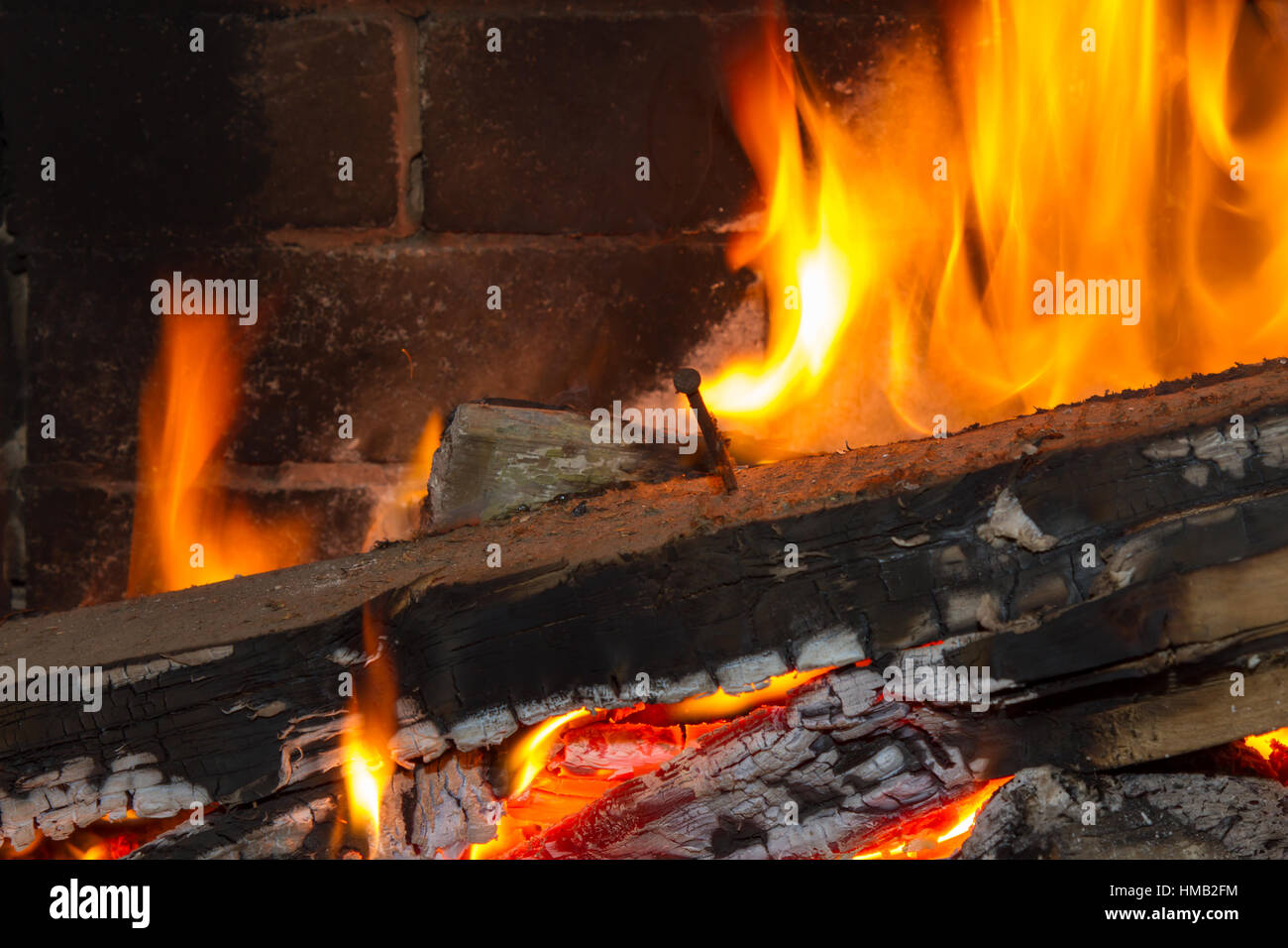 burning wood with nail Stock Photo Alamy