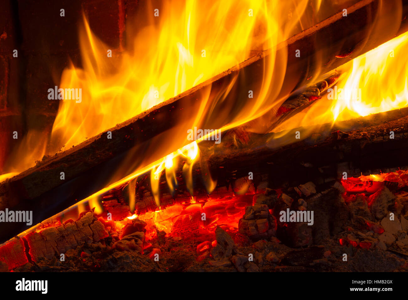 Burning wood in a fireplace Stock Photo Alamy