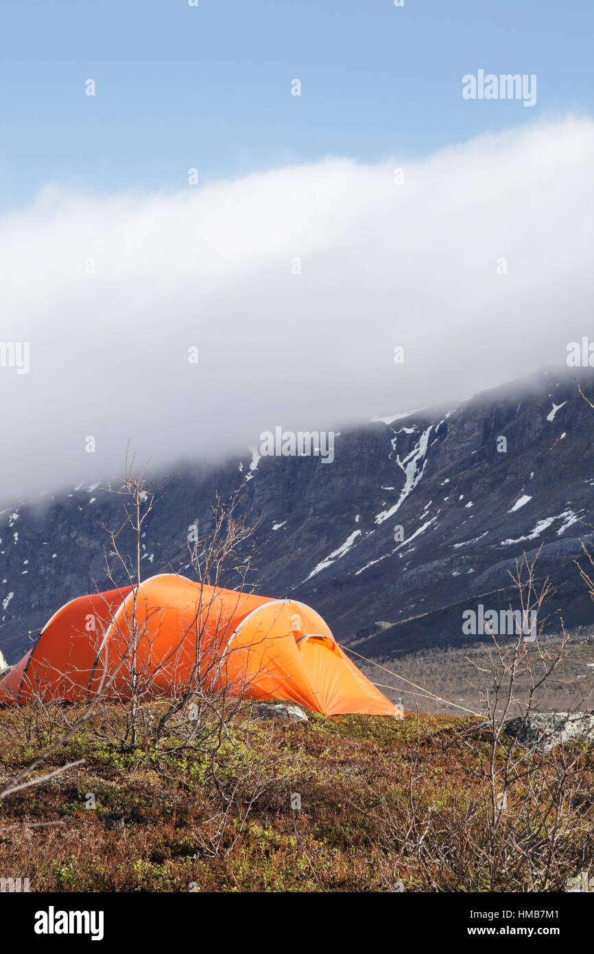 A hikers tent in the morning sun of Lapland mountains. Stock Photo