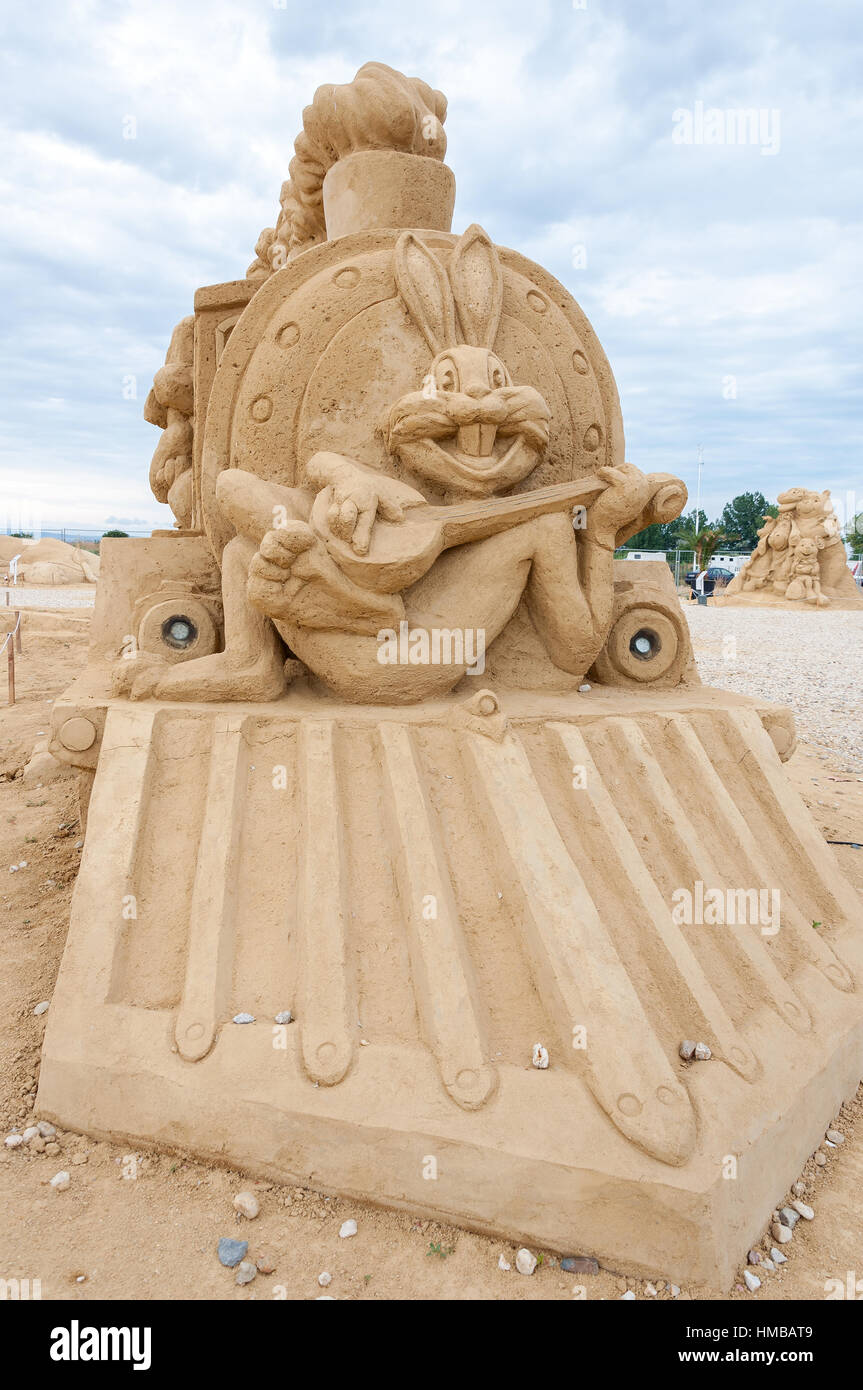 Sand sculpture of Bugs Bunny playing guitar at the front of steam ...