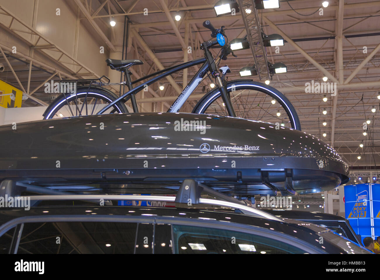 KIEV, UKRAINE - MAY 29: Mercedes-Benz trekking bike mounted on top of M-class car model on display of SIA' 2013 The 21st Kyiv International Motor Show Stock Photo