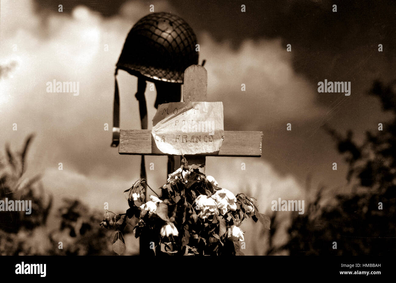 French civilians erected this silent tribute to an American soldier who has fallen in the crusade to liberate France from Nazi domination.  Carentan, France.  June 17, 1944. Himes.  (Army) NARA FILE #:  111-SC-190597 WAR & CONFLICT BOOK #:  1349 Stock Photo