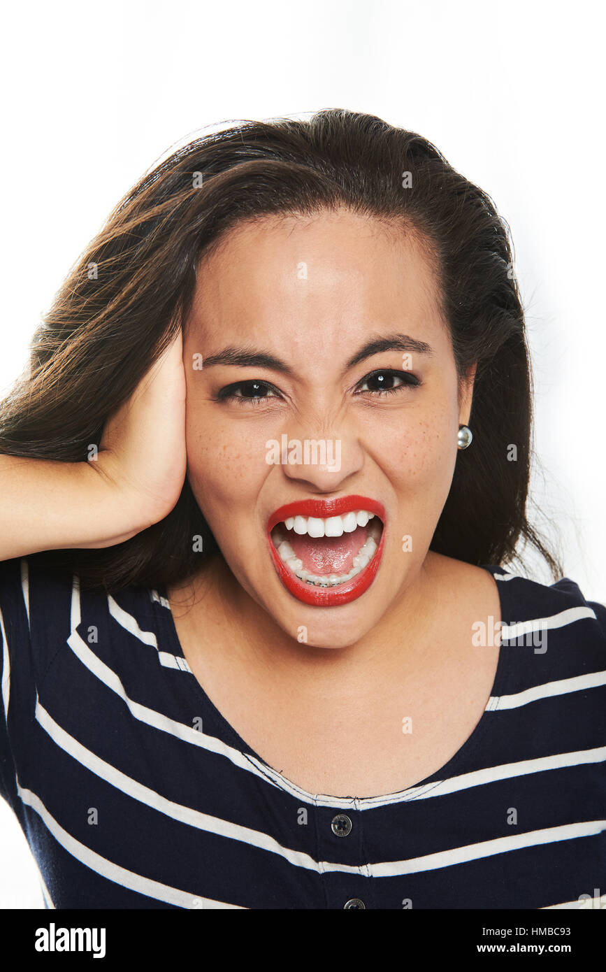 young woman screaming isolated on white background Stock Photo