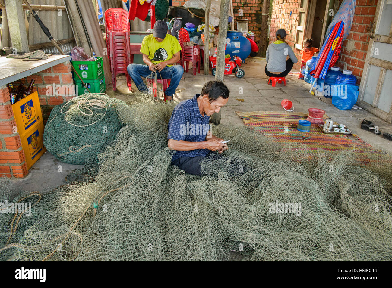 Mending fishing nets, Hoi An, Vietnam Stock Photo Alamy