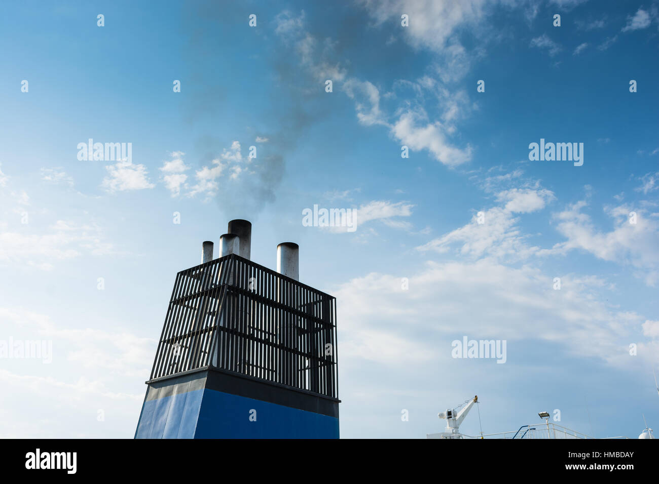 Aboard, chimney of a ferry or cruise ship, black smoke. Pollutes the ...