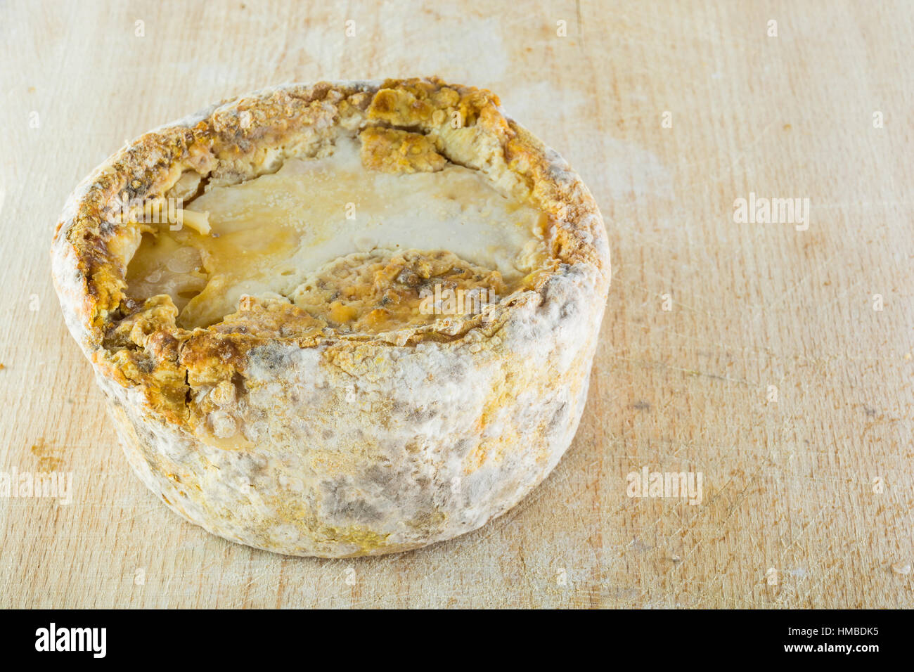 The form of hard cheese of a bloomy rind goat's milk, frost crust ...