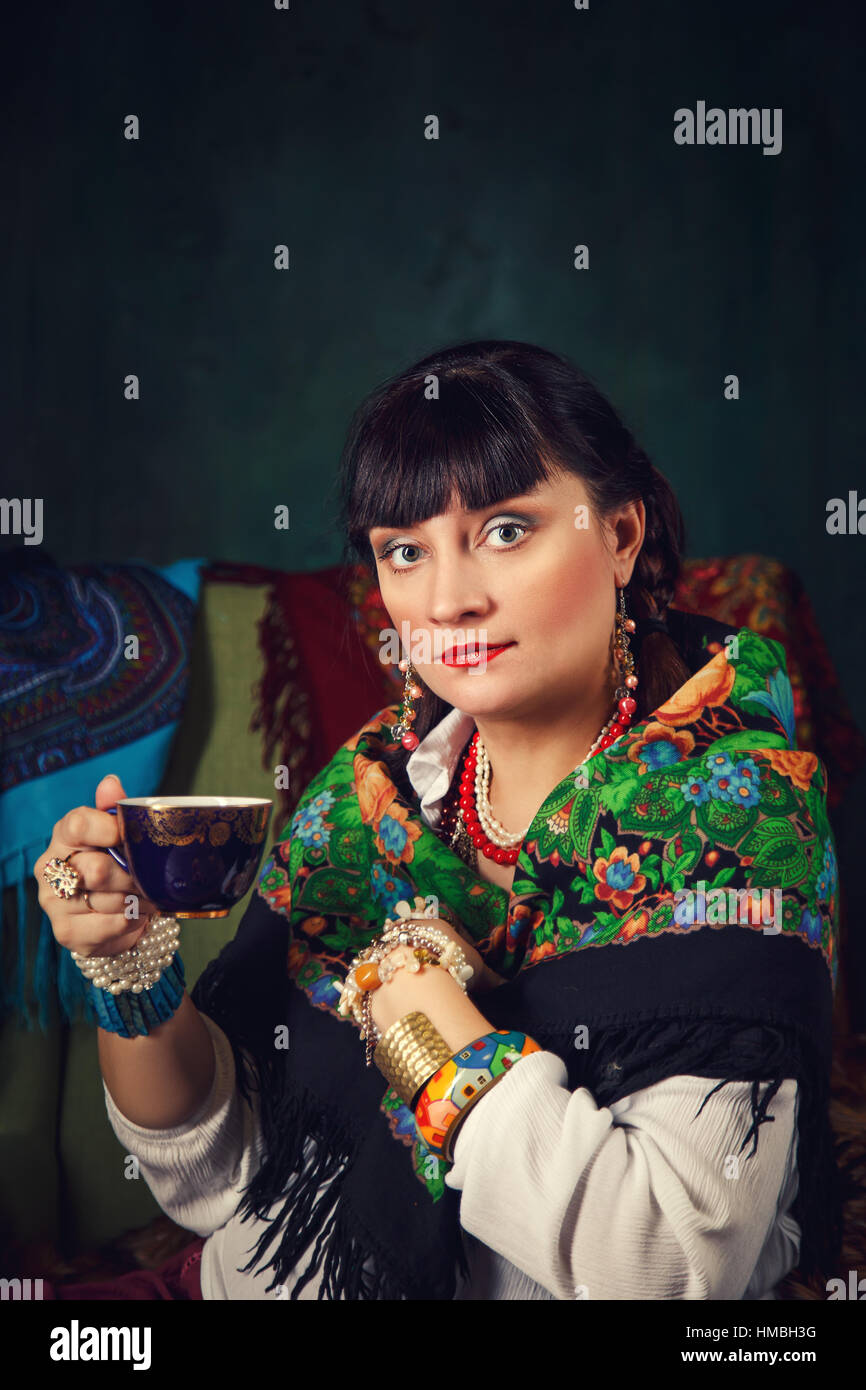 Portrait of a beautiful woman in Russian national costume Stock Photo ...