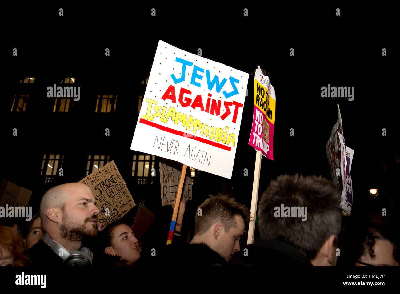 Protest against Donald Trump's travel ban on Muslims and the invite to a State visit. A protester holds a placard saying 'Jews against Islamophobia' Stock Photo