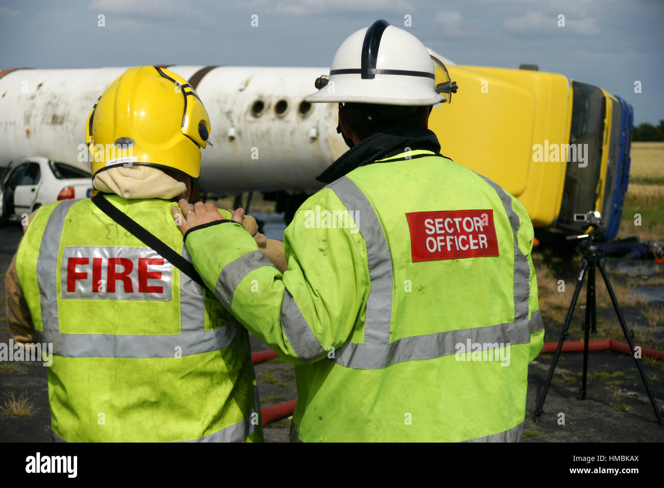 Fire Fighters At Car Crash Stock Photo Alamy