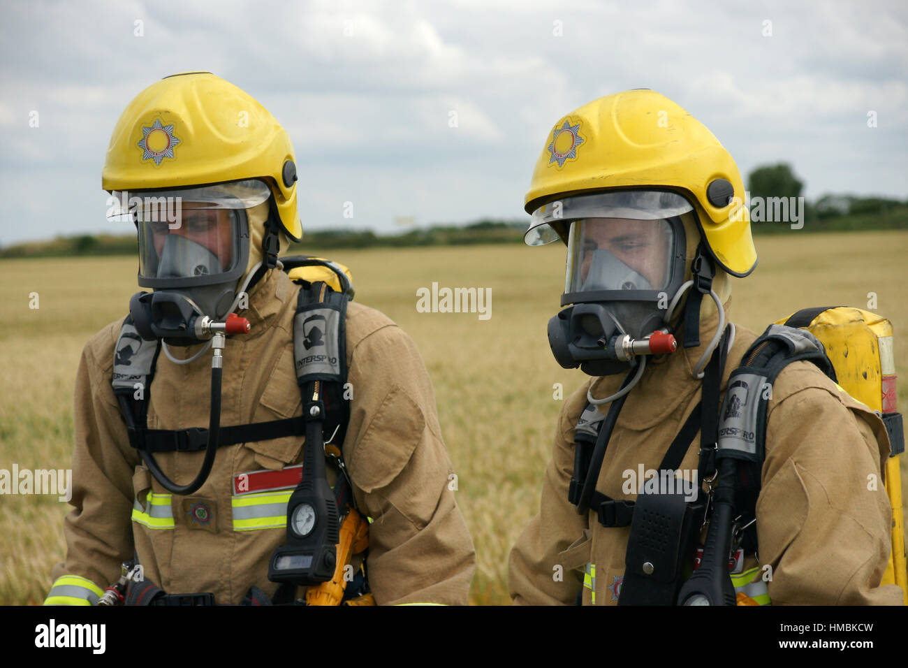 fire-fighters at disaster zone Stock Photo