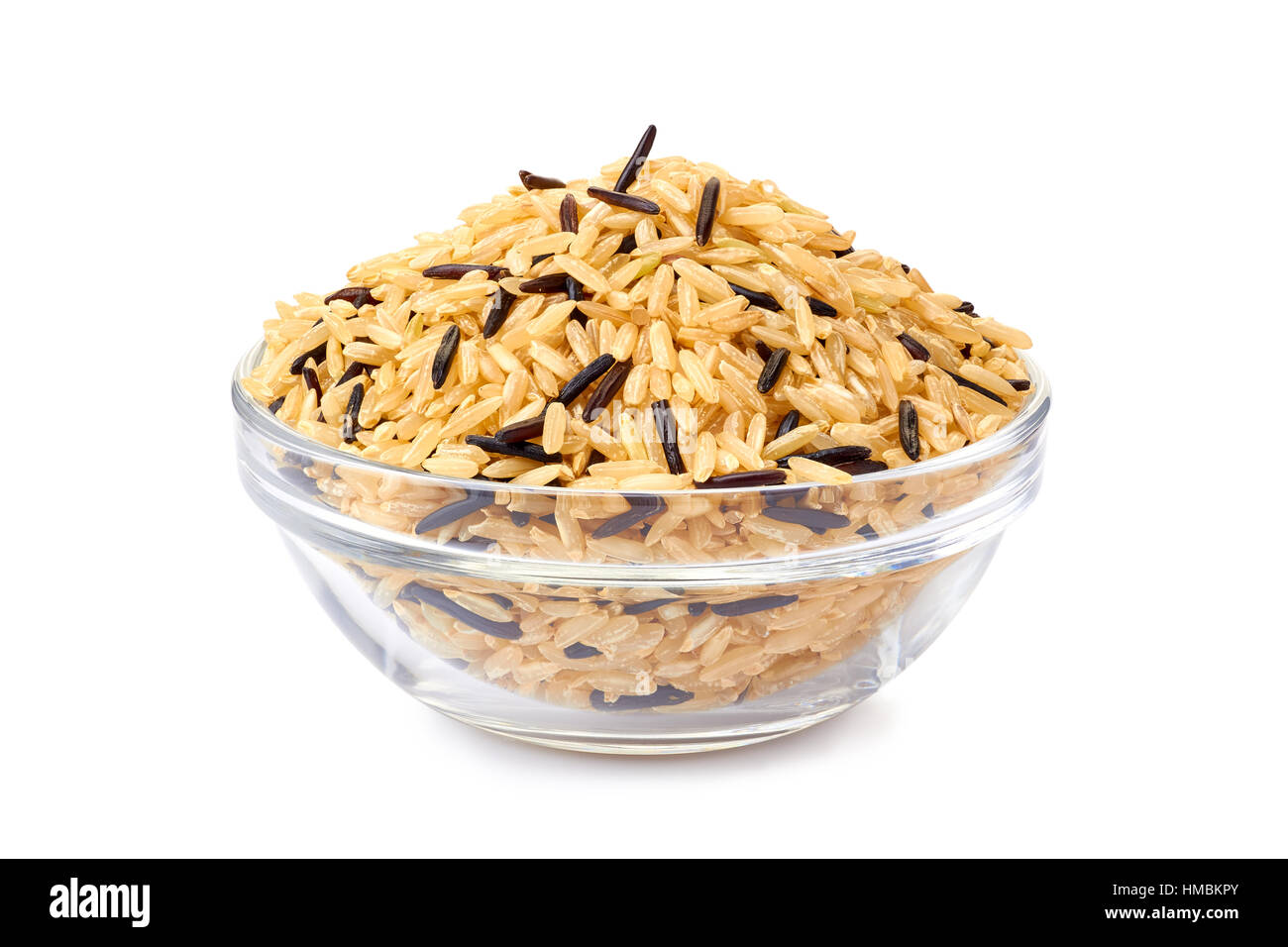 Brown and black rice in glass bowl on white Stock Photo